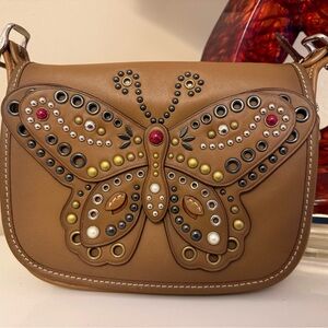 Butterfly-Studded Coach Crossbody Bag